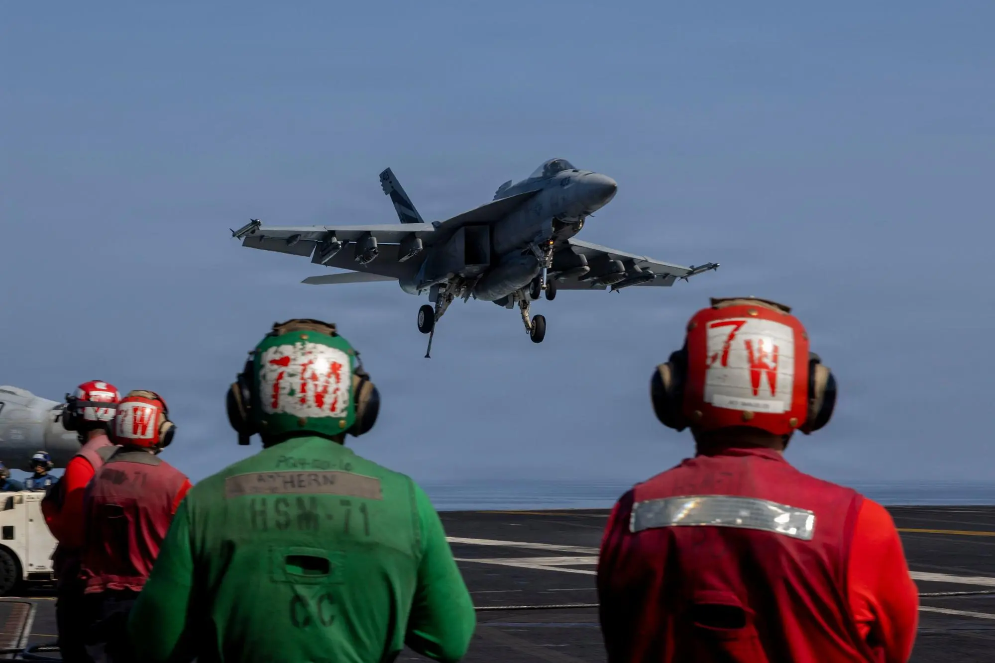 This image provided by U.S. Central Command shows a F/A-18E Super Hornet preparing to make an arrested landing the USS Abraham Lincoln (CVN 72) in support of Operation Epic Fury on Monday, March 2, 2026. (U.S. Navy via AP)