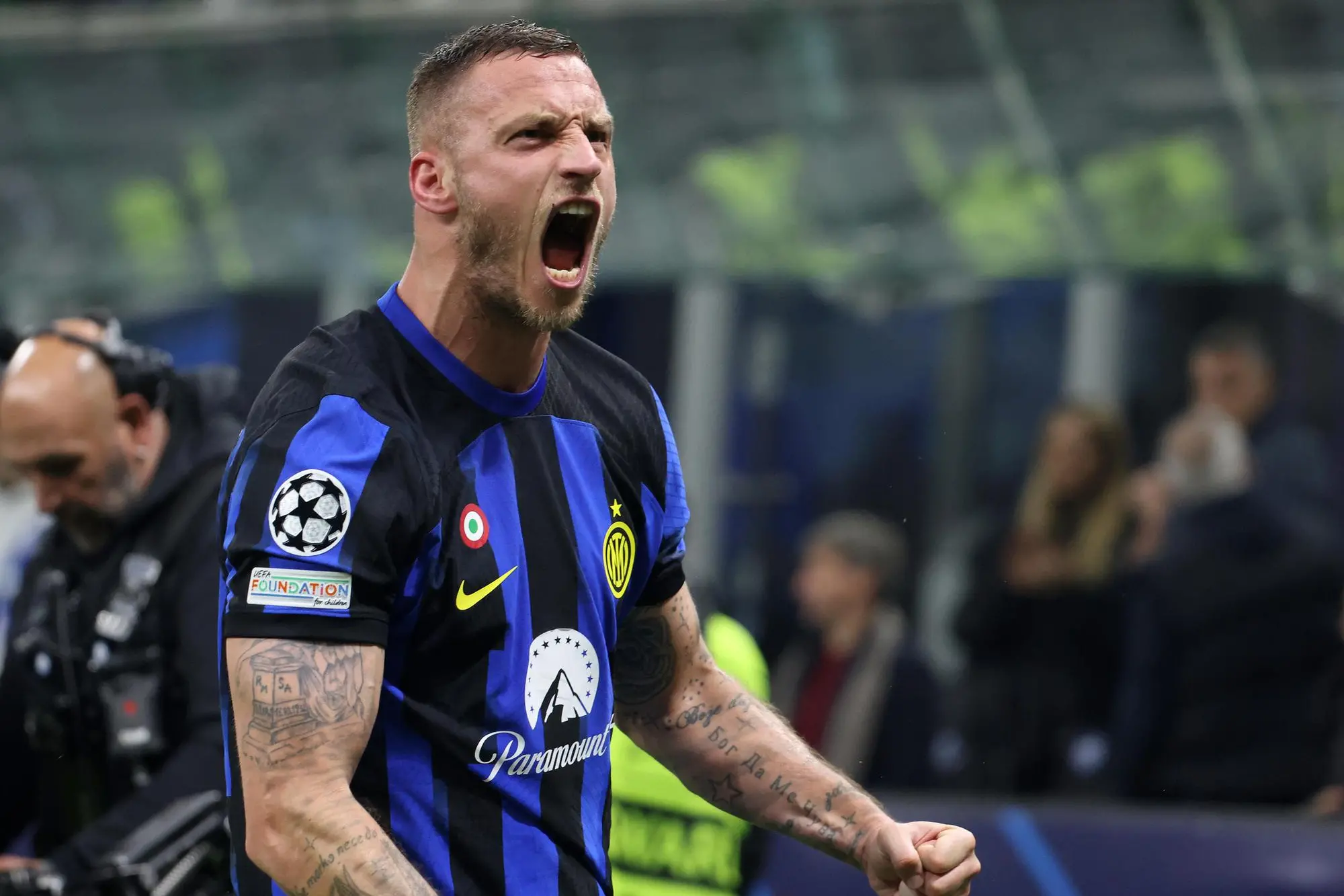Inter Milan’s Marko Arnautovic jubilates after scoring goal of 1 to 0 during the first leg of the round of 16 of the UEFA Champions League at Giuseppe Meazza stadium in Milan, 20 February 2024. ANSA / MATTEO BAZZI