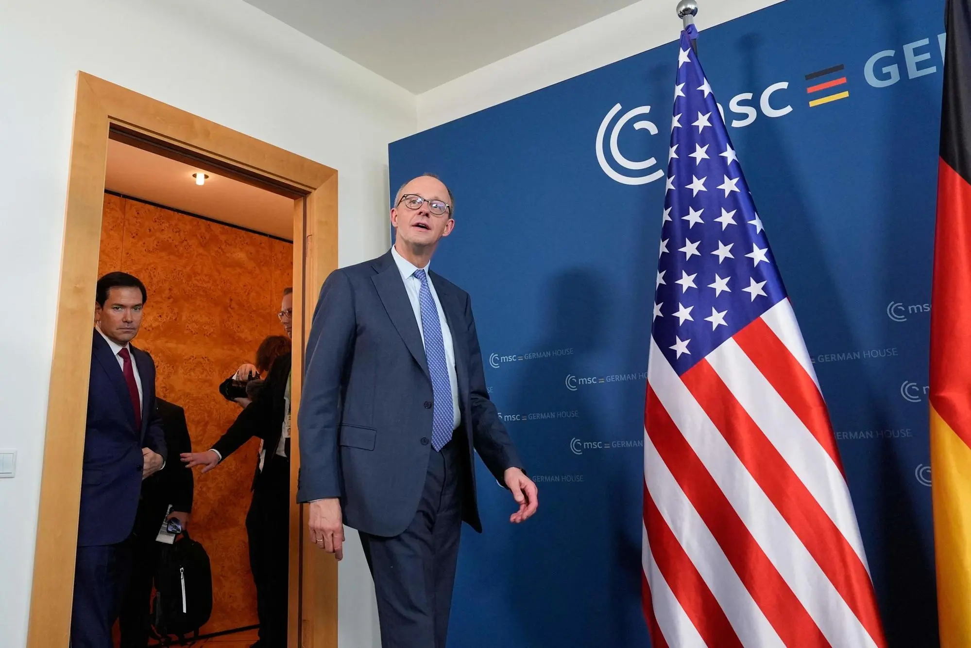 Мерц в Мюнхене (фото Алекс Брэндон / POOL / AFP через Ansa)