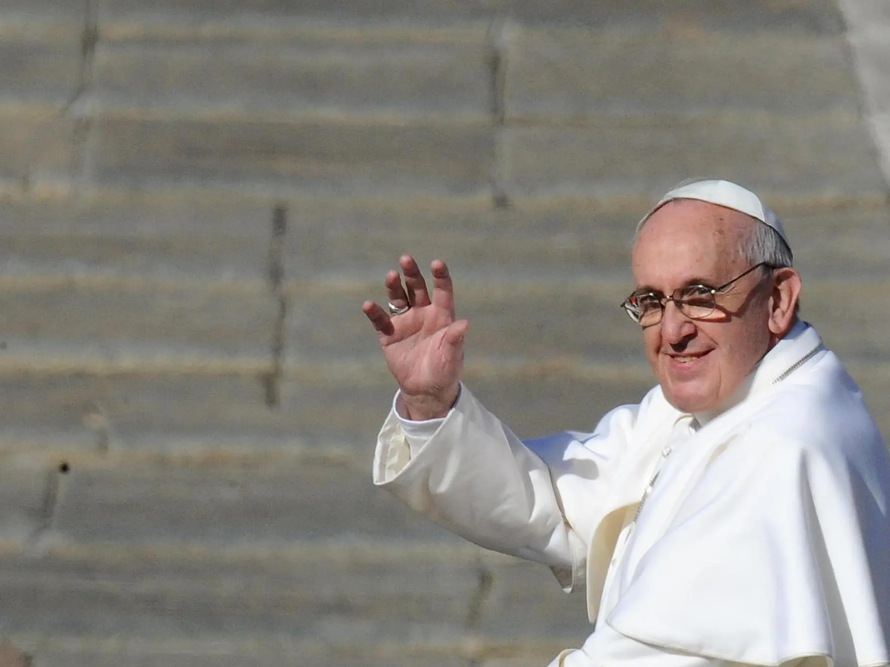Pope Francis waves to the crowd from the papamobile during his inauguration mass at St Peter's square on March 19, 2013 at the Vatican. World leaders flew in for Pope Francis's inauguration mass in St Peter's Square on Tuesday where Latin America's first pontiff will receive the formal symbols of papal power. ANSA/ETTORE FERRARI