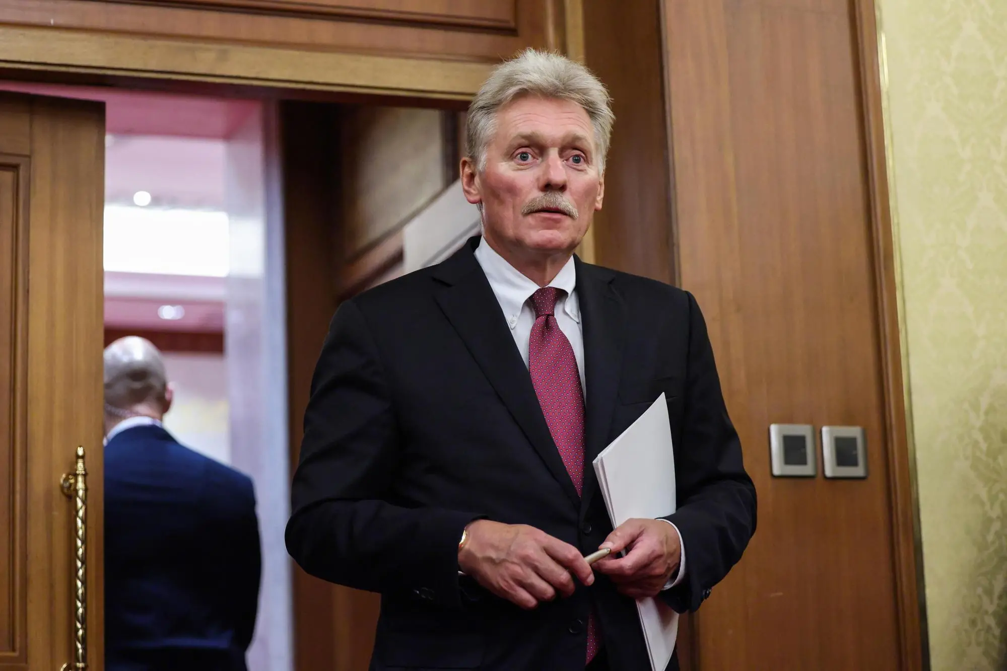 epa12345648 Kremlin spokesman Dmitry Peskov looks on at Diaoyutai State Guesthouse in Beijing, China, 02 September 2025, one day ahead of China's Victory Parade commemorating the end of WWII. EPA/Maxim Shemetov / POOL