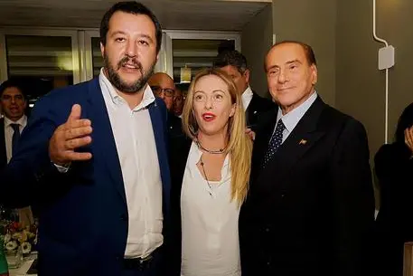 Matteo Salvini, Giorgia Meloni e Silvio Berlusconi in una foto d'archivio (Ansa)