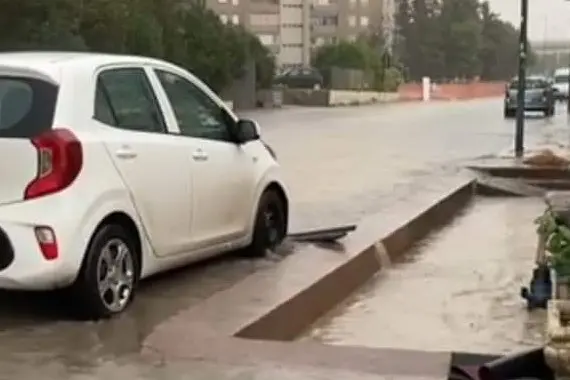 Una strada di Sassari allagata dalla bomba d'acqua del 10 settembre (foto Tellini)