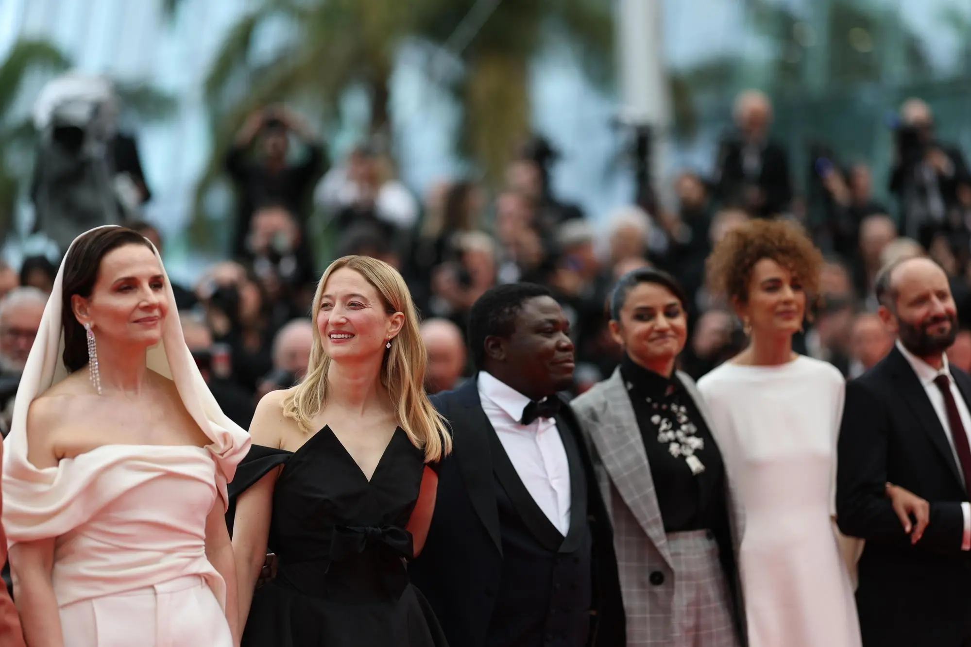 epa12097520 Jury members Juliette Binoche (L), Alba Rohrwacher (2-L) and others attend the 'Partir Un Jour (Leave One Day)' screening and opening ceremony of the 78th annual Cannes Film Festival, in Cannes, France, 13 May 2025. The film festival runs from 13 to 24 May 2025. EPA/MOHAMMED BADRA