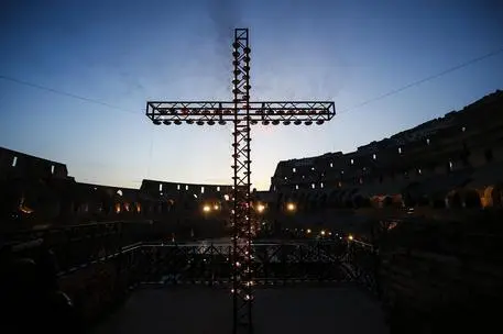 A general view over the inside of the Colosseum durign the Via Crucis (Way of the Cross) torchlight procession on the Good Friday in Rome, Italy, 19 April 2019. ANSA/FABIO FRUSTACI