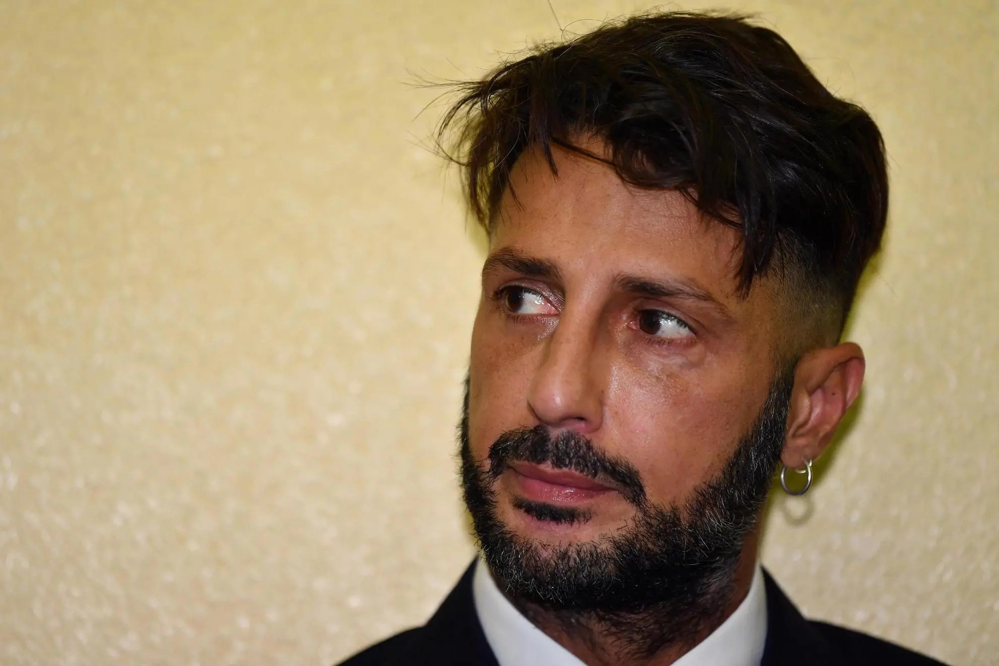 Italian photographic agent, television and media personality Fabrizio Corona wait for the hearing in Milan, 21 September 2018. Fabrizio Corona was sentenced to one year by the Court of Milan in the process with the center about 2.6 million euros in cash found partly in a false ceiling and partly in safe deposit boxes in Austria. ANSA/DANIEL DAL ZENNARO