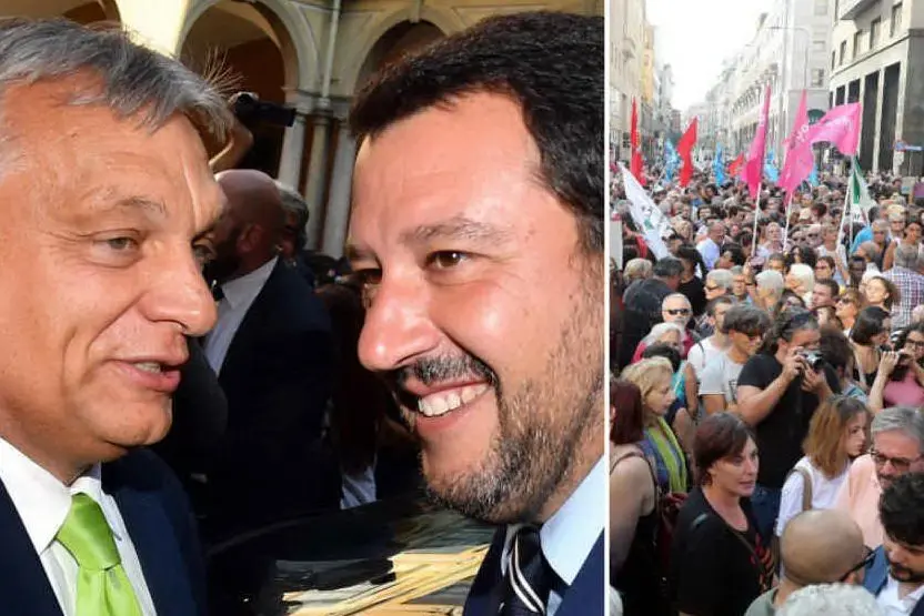 Salvini e Orban. A destra la protesta a Milano