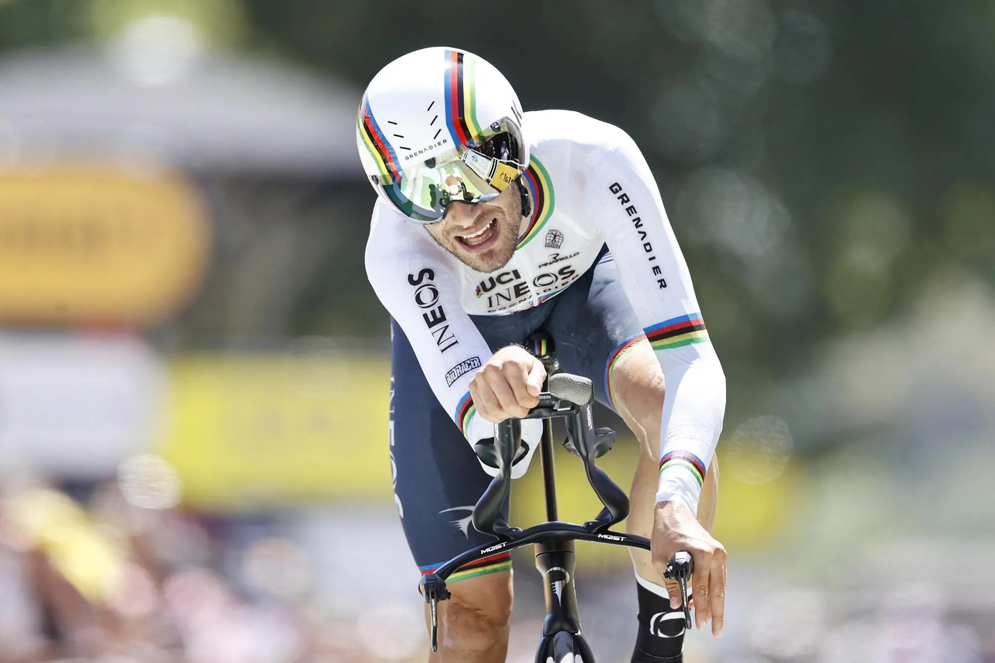 epa10087760 Italian rider Filippo Ganna of Ineos Grenadiers crosses the finish line during the 20th stage of the Tour de France 2022, an individual time trial over 40.7km from Lacapelle-Marival to Rocamadour, France, 23 July 2022. EPA/GUILLAUME HORCAJUELO