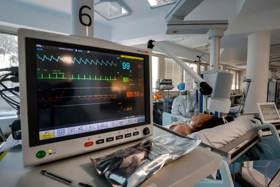 Health workers wearing overalls and protective masks in the intensive care unit of the Covid intensive care unit of the GVM ICC hospital of Casal Palocco. Rome, Italy, 21 January 2022. ANSA/GIUSEPPE LAMI