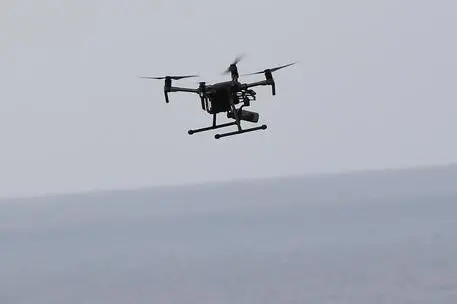 epa07659231 A drone operates around the cliffs on Cape Byron as the search continues for missing backpacker Theo Hayez at Byron Bay on the far north New South Wales coast, Australia, 20 June 2019. The 18-year-old Belgian national was last seen on 31 May. EPA/DAVE HUNT AUSTRALIA AND NEW ZEALAND OUT