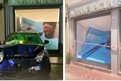 La vetrina della farmacia sfondata dalla vettura (foto Pala)