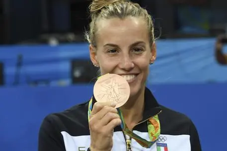 Italy's Tania Cagnotto shows her bronze medal after the women's 3-meter springboard diving final in the Maria Lenk Aquatic Center at the 2016 Summer Olympics in Rio de Janeiro, Brazil, Sunday, Aug. 14, 2016. ANSA / CIRO FUSCO