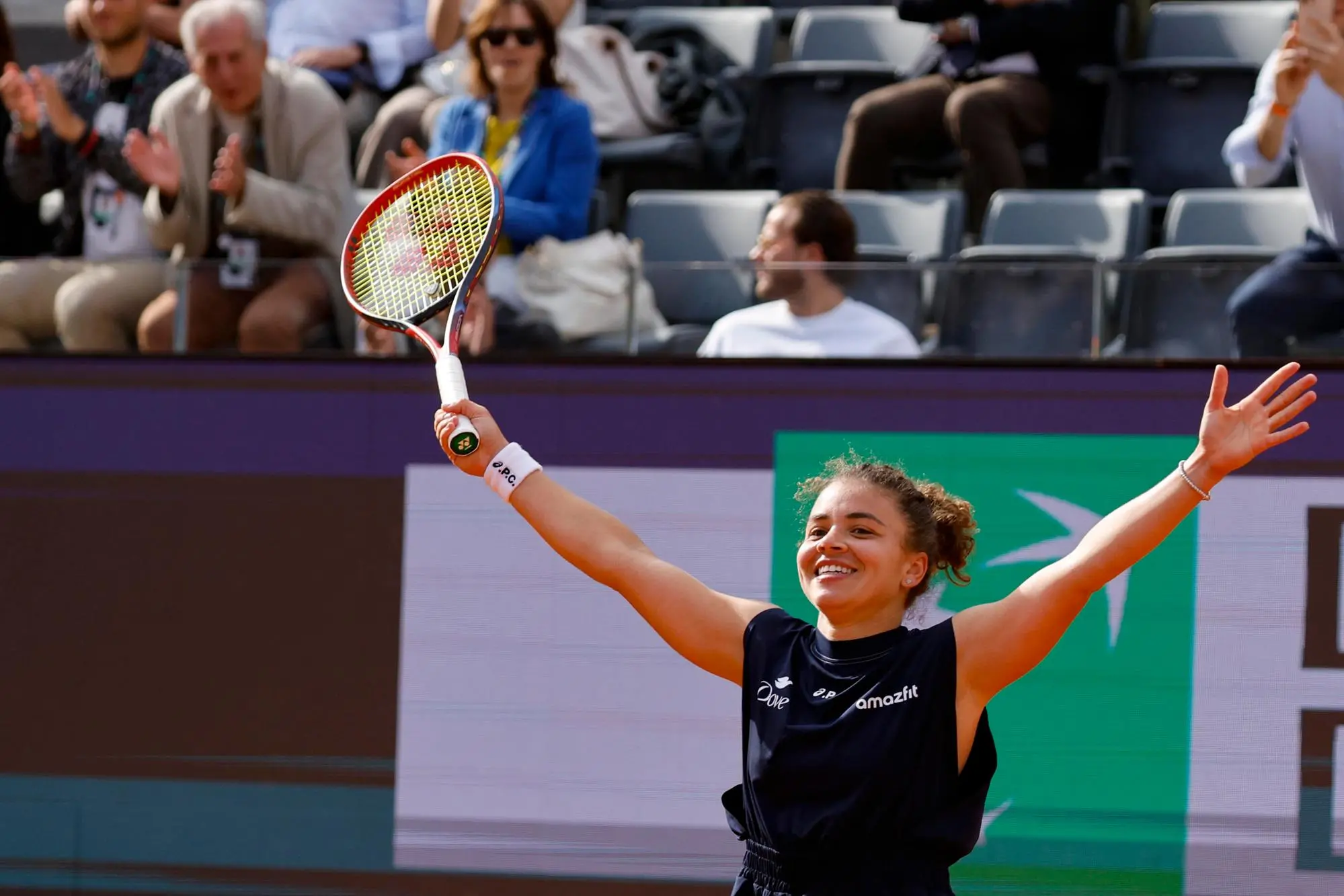 Jasmine Paolini of Italy celebrates after winning her women’s semi-final match against Peyton Stearns of USA (not pictured) at the Italian Open tennis tournament in Rome, Italy, 15 May 2025. ANSA/FABIO FRUSTACI