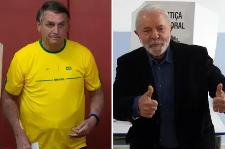 Da sinistra i due candidati: Bolsonaro e Lula (Ansa)