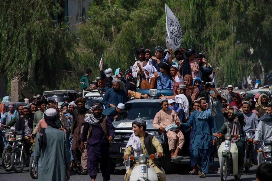 I talebani festeggiano la vittoria (Ansa)