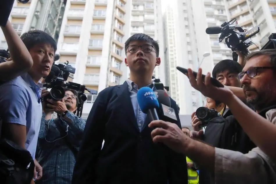 L'attivista Joshua Wong a sostegno dei democratici (Ansa - Fazry Ismail)