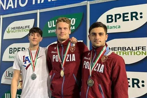 Al centro il campione italiano Marcello Guidi, 25 anni, a sinistra il secondo classificato Matteo Diodato e a destra il terzo classificato Giuseppe Ilario (foto concessa da Marcello Guidi)