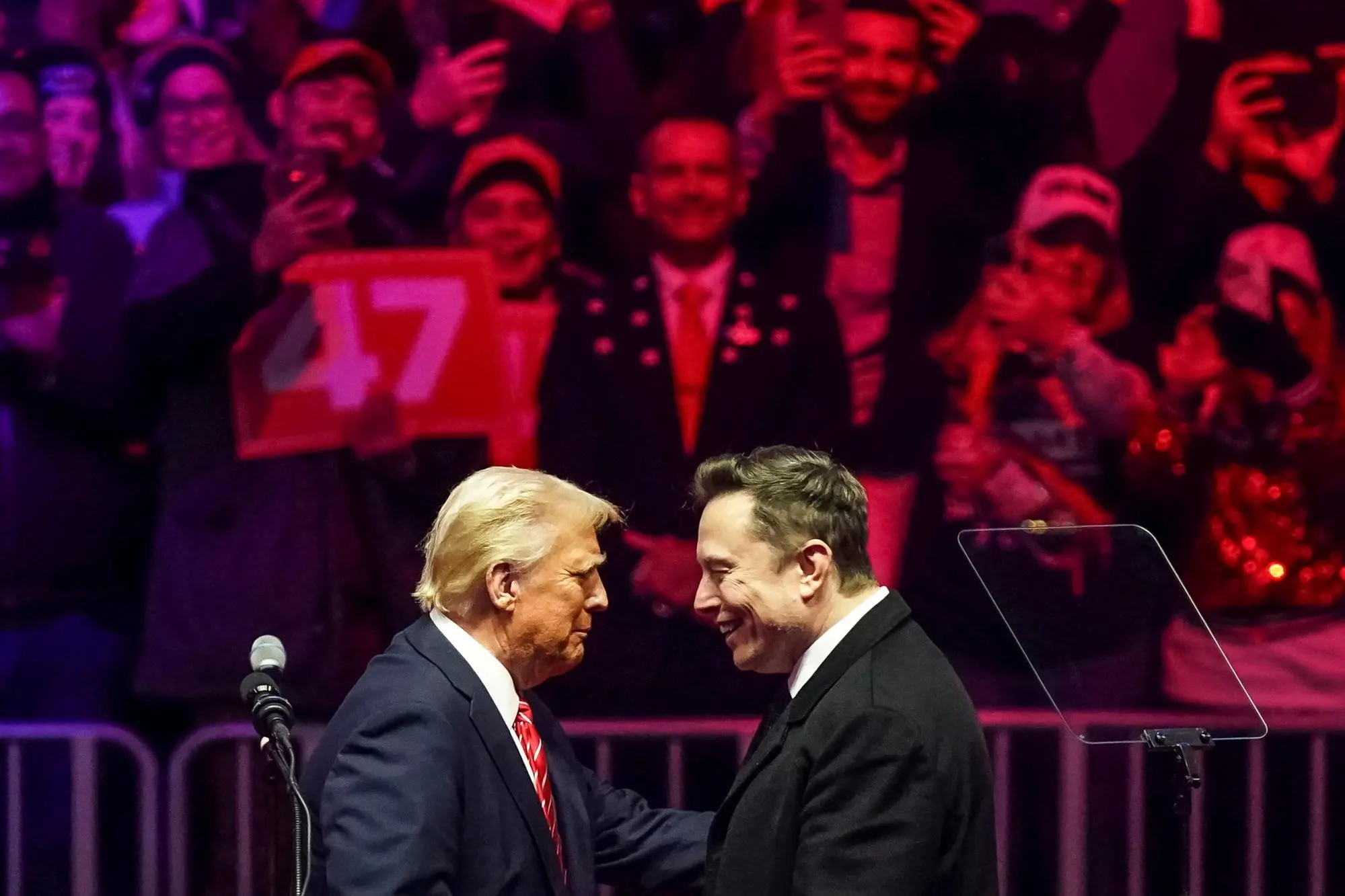 epa11837518 US President-elect Donald Trump (L) with businessman Elon Musk (R) on stage during a rally at Capital One Arena in Washington, DC, USA, 19 January 2025. President-elect Donald Trump, who defeated Joe Biden to become the 47th president of the United States, will be inaugurated on 20 January, though all of the planned outdoor ceremonies and events have been cancelled due to a forecast of extreme cold temperatures. EPA/WILL OLIVER