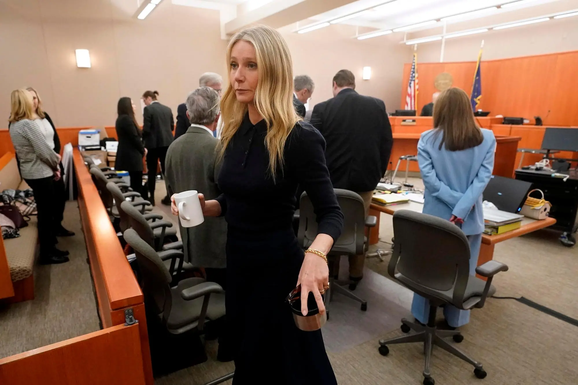 epa10541854 Gwyneth Paltrow exits the courtroom with a ceramic mug and metal cup after testifying about a 2016 ski collision that left a man with broken ribs and head trauma, in Park City, Utah, USA, 24 March 2023. EPA/Rick Bowmer / POOL