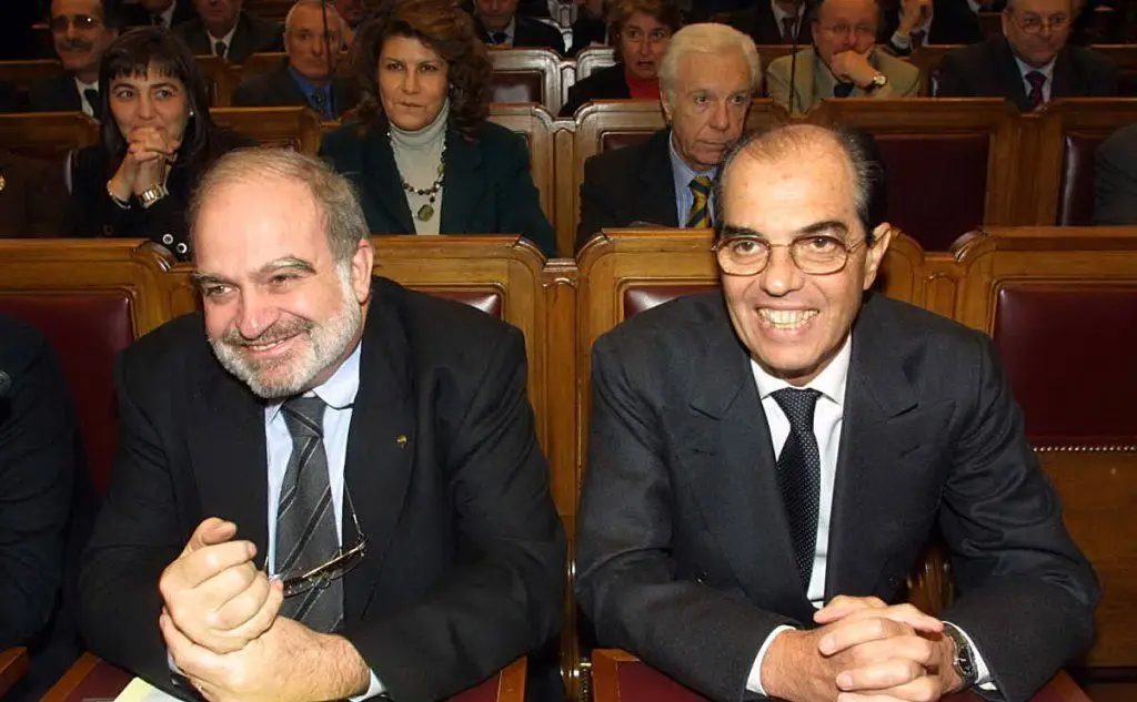 In un convegno a Roma, nel 2003, accanto al sindacalista Savino Pezzotta