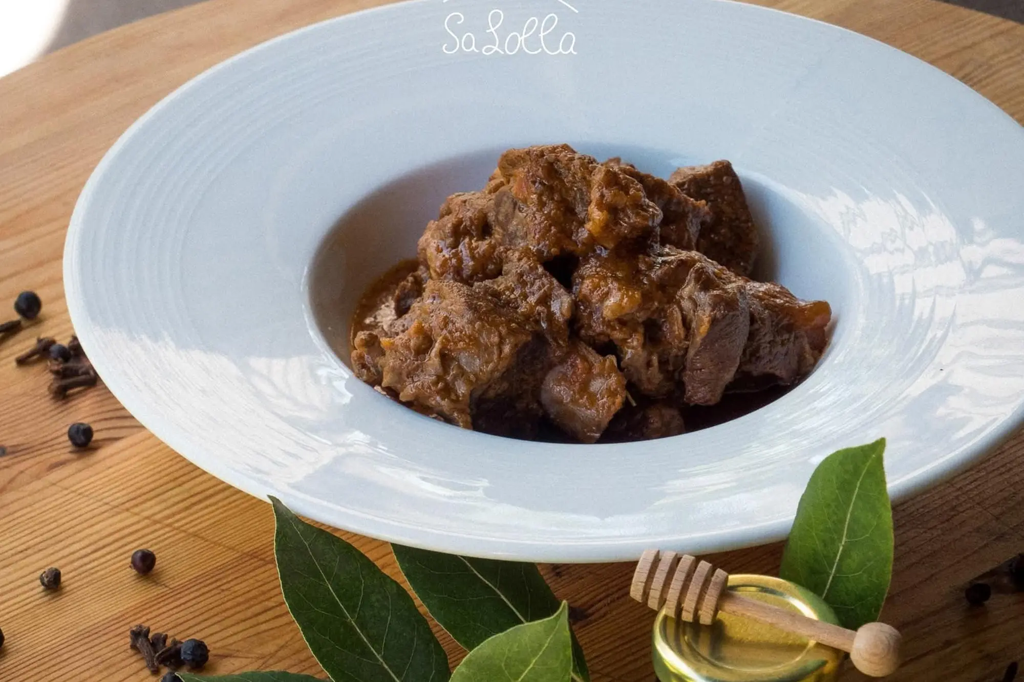 Brasato di carne di capra al miele