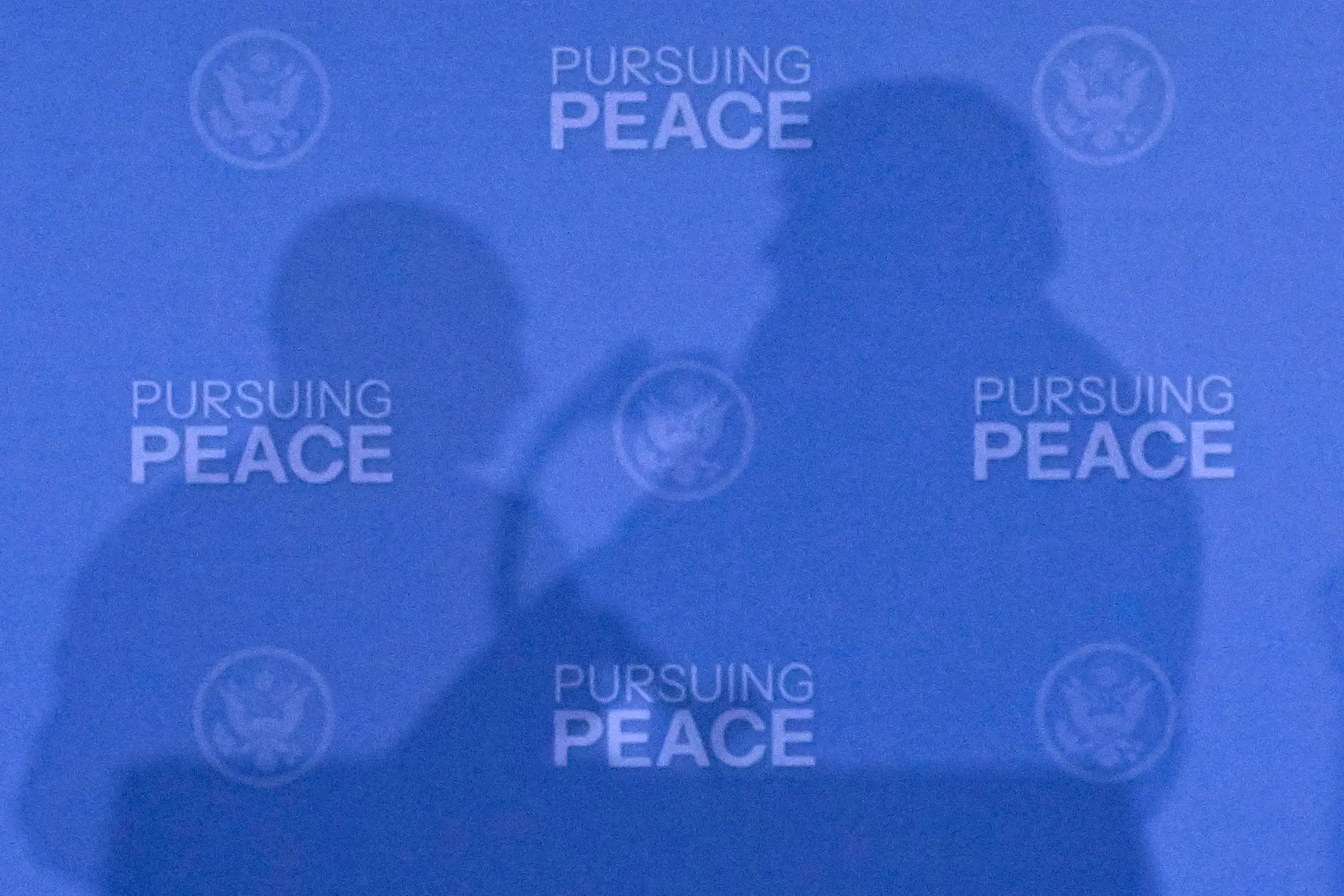 epaselect epa12303766 The shadows of Russian President Vladimir Putin (L) and US President Donald Trump (R) as they attend a meeting at Joint Base Elmendorf-Richardson in Anchorage, Alaska, USA, 15 August 2025. EPA/SERGEY BOBYLEV/SPUTNIK/KREMLIN POOL / POOL MANDATORY CREDIT