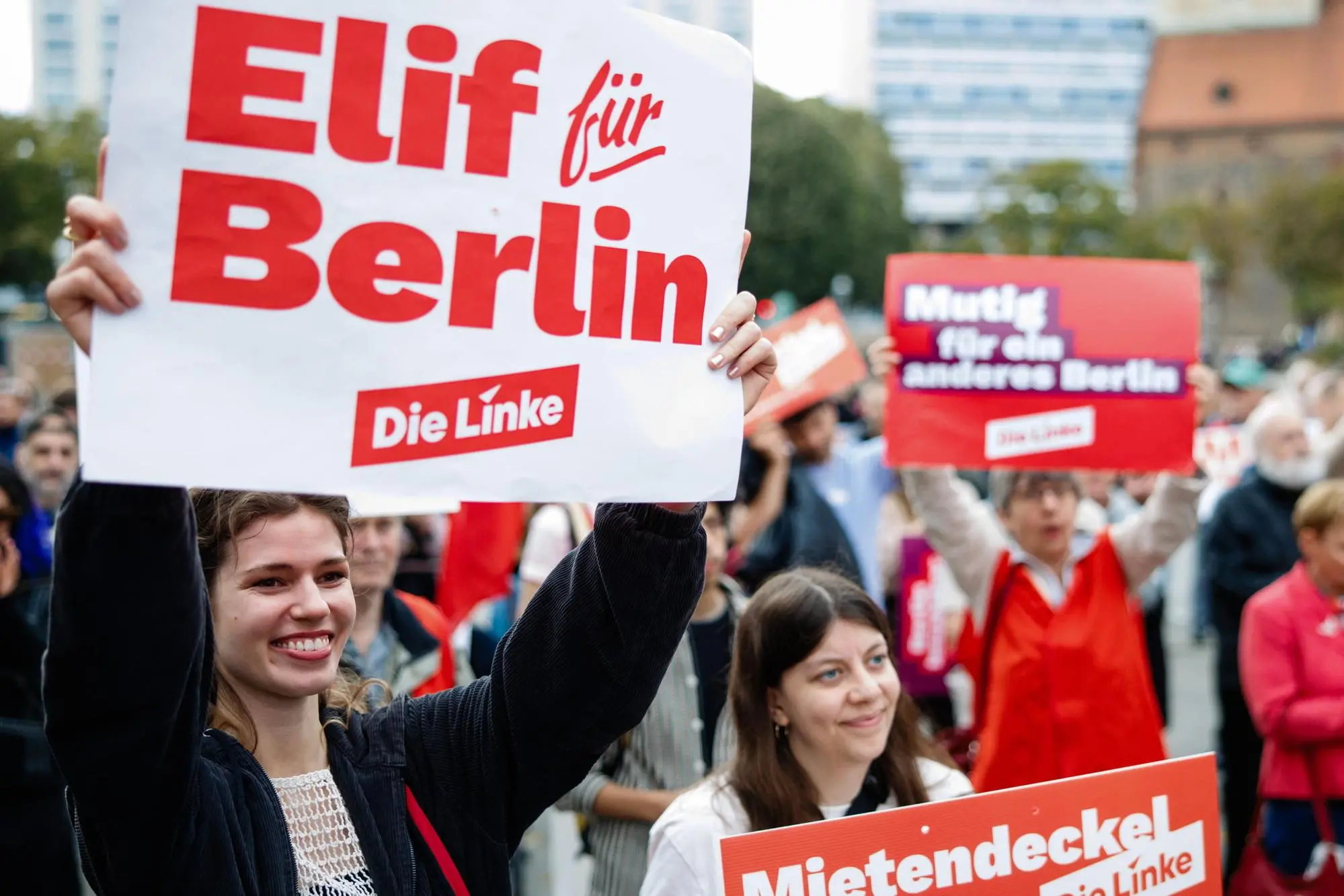 epa13248558 A participant holds a placard that reads 'Elif for Berlin', referring to the top candidate for the upcoming election in Berlin of The Left party (Die Linke), Elif Eralp (not pictured), during the final election campaign rally of The Left (Die Linke) party prior to the House of Representatives election in Berlin, Germany, 18 September 2026. The Berlin House of Representatives election is scheduled for 20 September 2026. EPA/CLEMENS BILAN