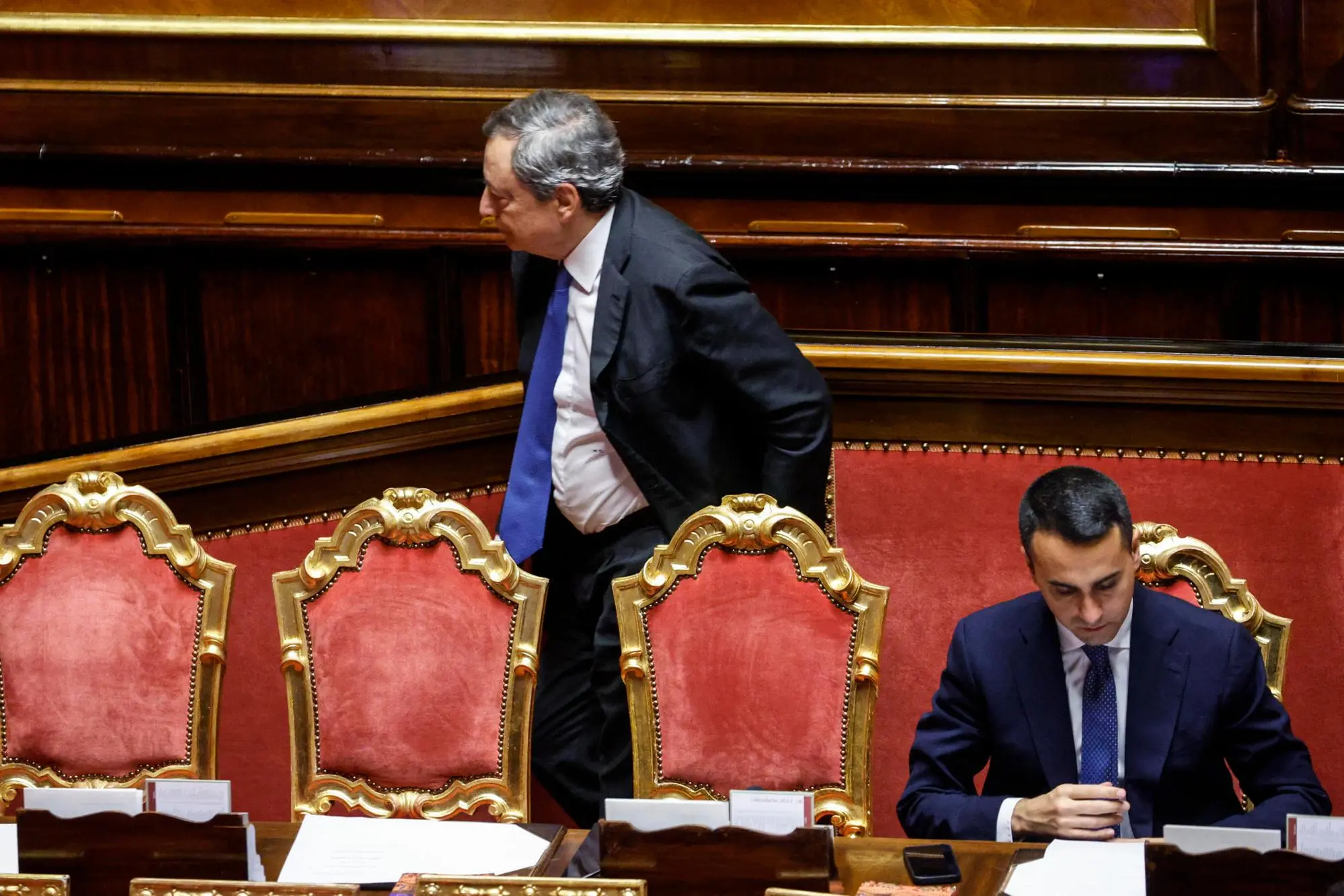 Italy's Prime Minister Mario Draghi (L) and Italian Foreign Minister Luigi Di Maio attends a Senate session on a confidence vote on his government, Rome 20 July 2022. ANSA/FABIO FRUSTACI