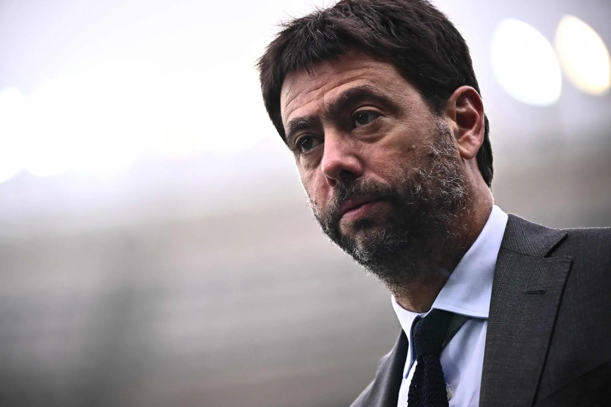 (FILES) Juventus' then president Andrea Agnelli attends the Italian Serie A football match between Torino and Juventus on October 15, 2022 at the Olympic stadium in Turin. Juventus on May 22, 2023 were given a 10-point deduction in Serie A after a revision of their initial 15-point penalty inflicted on the club over illicit transfer activity. Long bans given to former chairman Andrea Agnelli, ex-CEO Maurizio Arrivabene and sporting directors Federico Cherubini and Fabio Paratici were upheld in April. (Photo by Marco BERTORELLO / AFP)