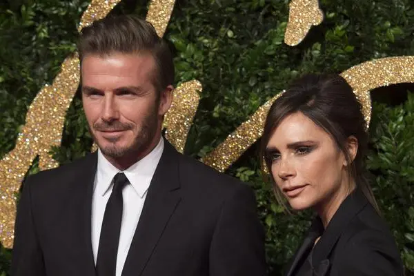 David Beckham con la moglie Victoria (foto Ansa/Epa)