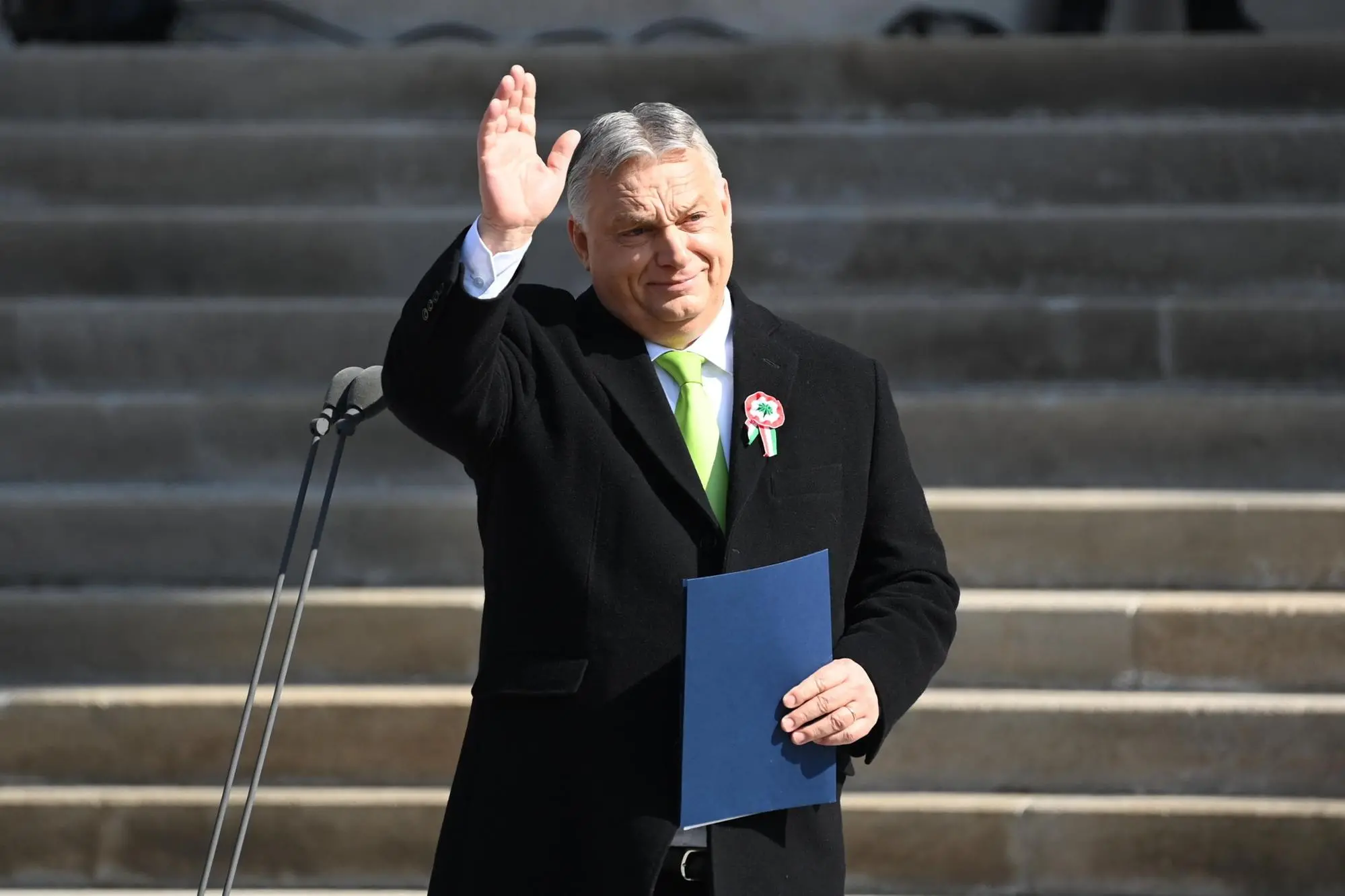 epa11221942 Hungarian Prime Minister Viktor Orban waves on the steps of the Hungarian National Museum during the official state ceremony to mark the 176th anniversary of the outbreak of the 1848 revolution and war of independence against Habsburg rule in Budapest, Hungary, 15 March 2024. EPA/ZOLTAN MATHE HUNGARY OUT