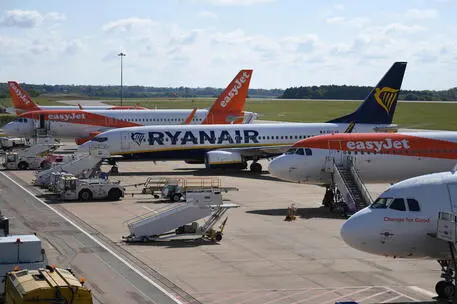 EasyJet and Ryanair aircraft are parked at Luton Airport, in Britain, 02 May 2020. ANSA/NEIL HALL