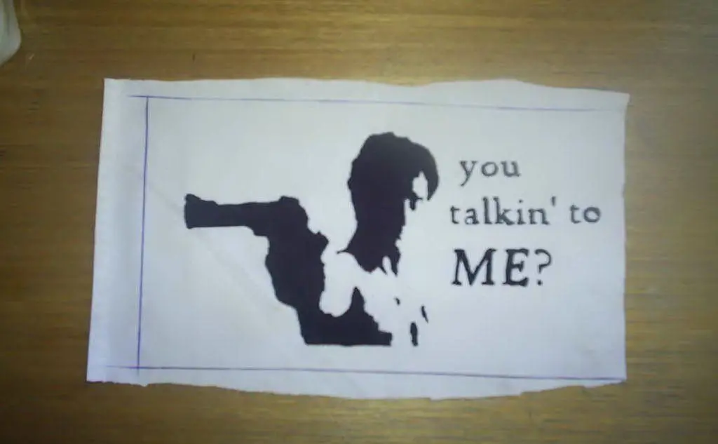 &quot;Stai parlando con me?&quot;, la frase più celebre del film, su un volantino pubblicitario