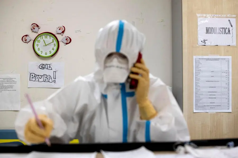 A healthcare worker wearing a protective suit and mask at the Covid 19 Emergency Department of the San Filippo Neri Hospital during the Coronavirus Covid -19 pandemic emergency in Rome, Italy, 04 January 2020. ANSA/MASSIMO PERCOSSI