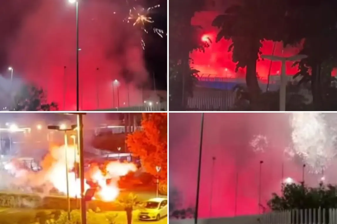 I fuochi d'artificio dei tifosi del Napoli sotto l'albergo del Cagliari