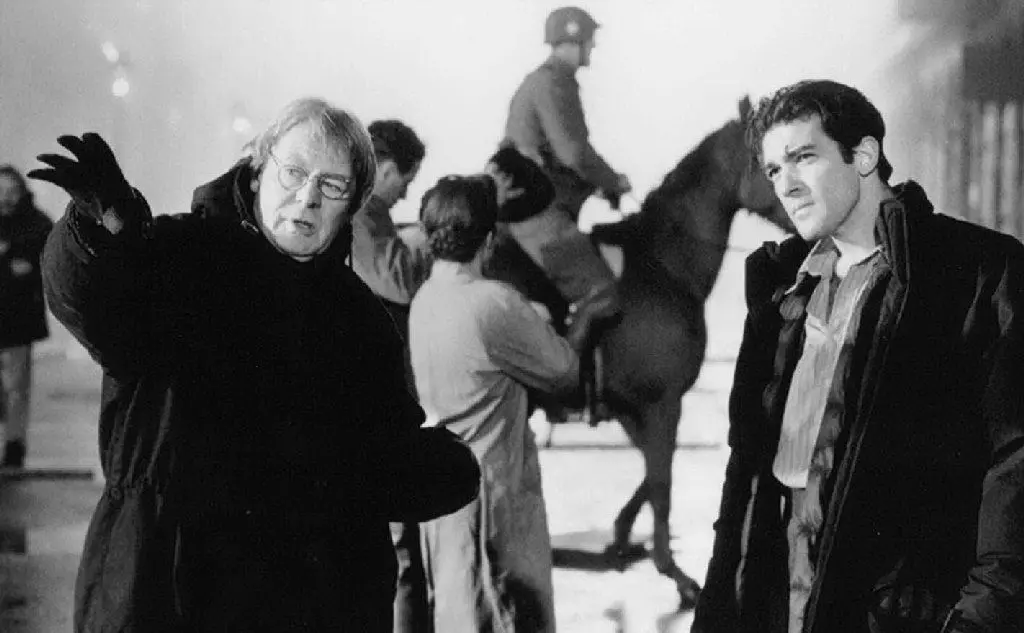 Sul set di &quot;Evita&quot; con il regista Alan Parker (foto Imdb)