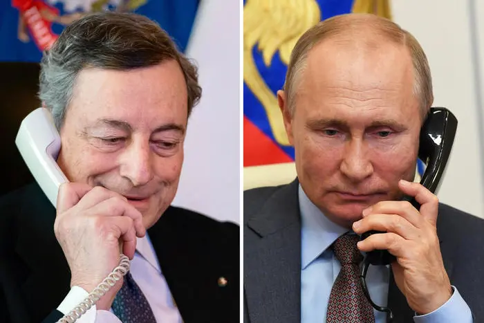 Draghi e Putin (Ansa)