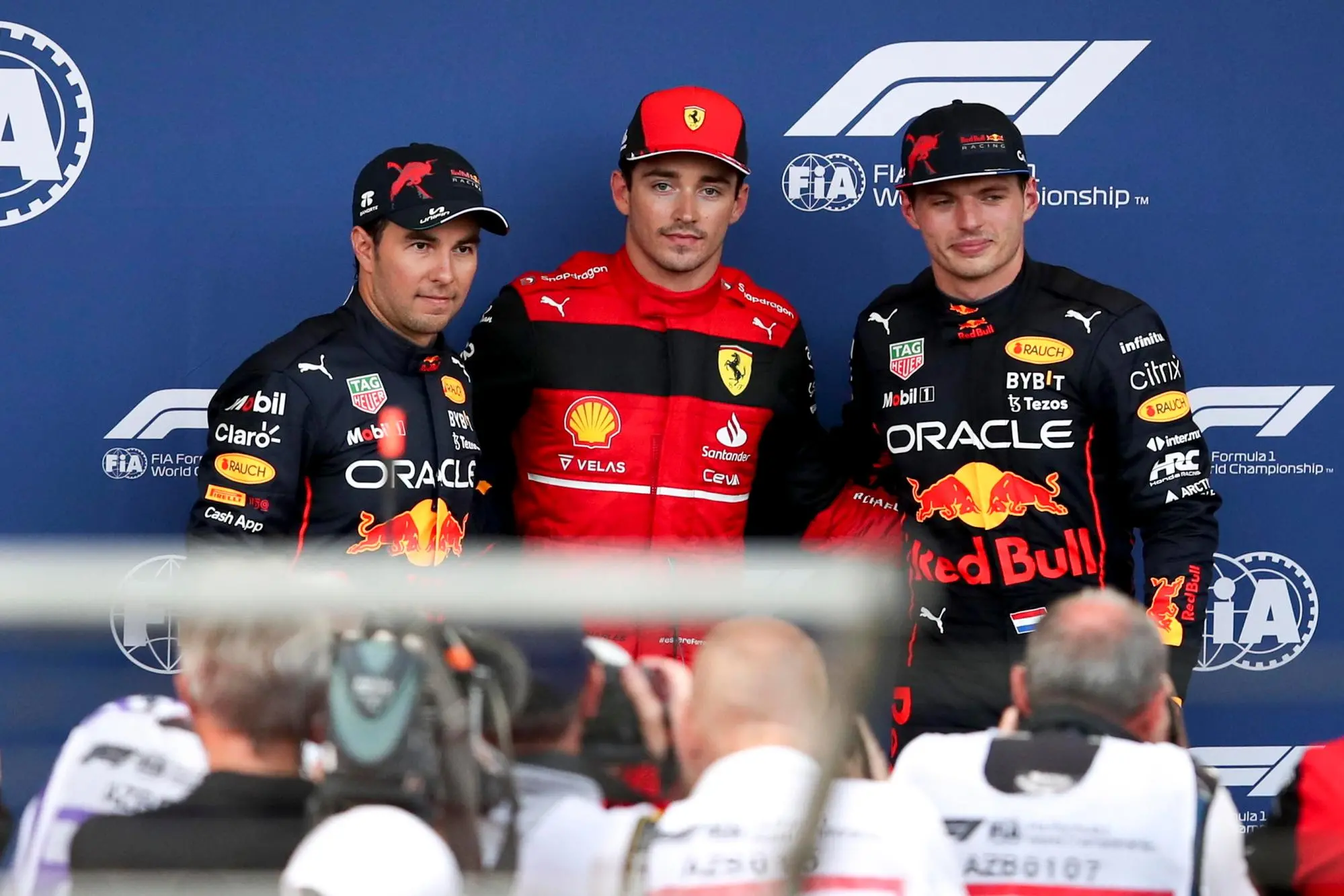 epa10008000 (L-R) Mexican Formula One driver Sergio Perez of Red Bull Racing, Monaco's Formula One driver Charles Leclerc of Scuderia Ferrari, and Dutch Formula One driver Max Verstappen of Red Bull Racing pose on the parc ferme at the end of qualifying of the Formula One Grand Prix of Azerbaijan at the Baku City Circuit in Baku, Azerbaijan, 11 June 2022. The Formula One Grand Prix of Azerbaijan will take place on 12 June 2022. EPA/ALI HAIDER