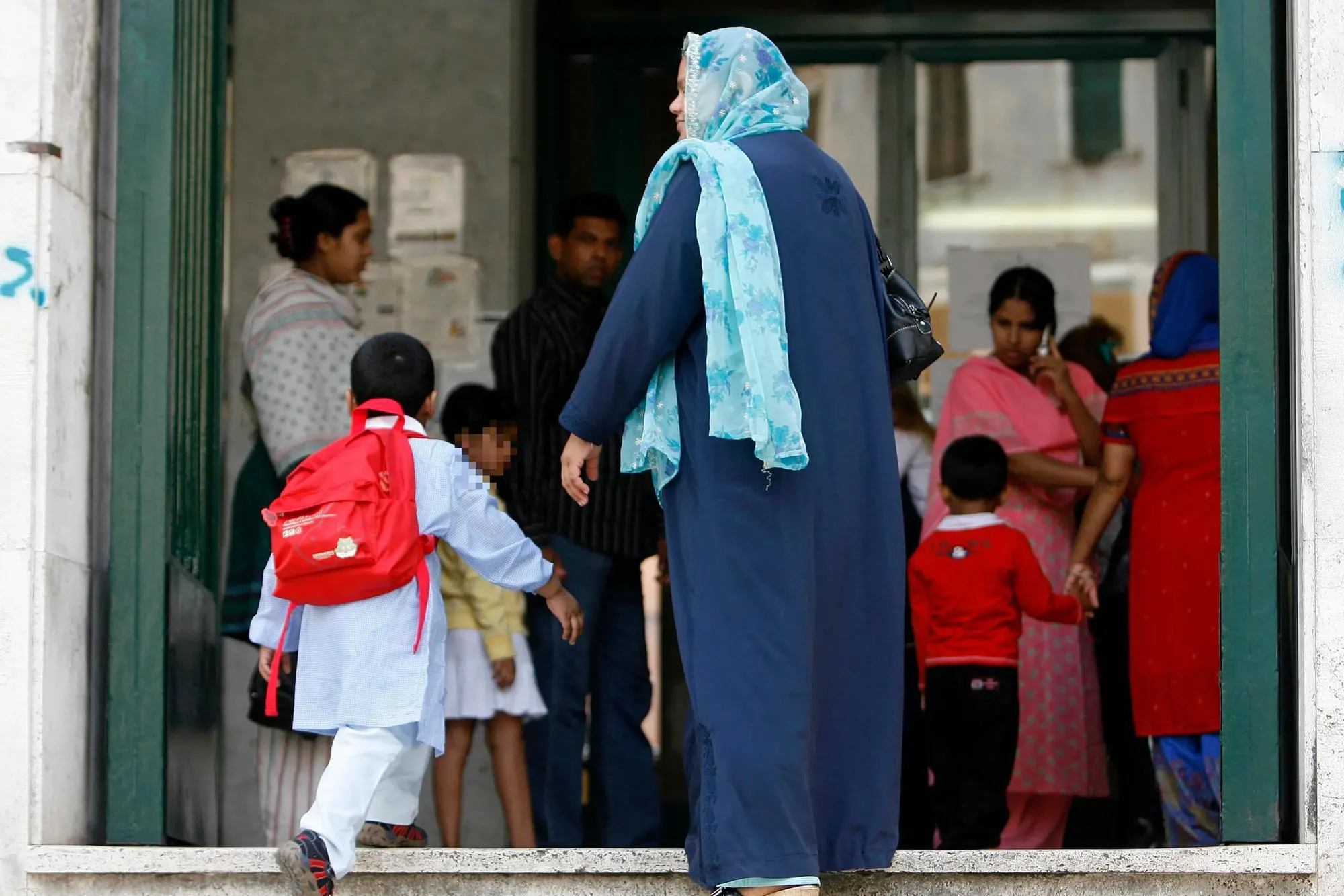 Alcuni bambini figli di immigrati. ANSA-MASSIMO PERCOSSI