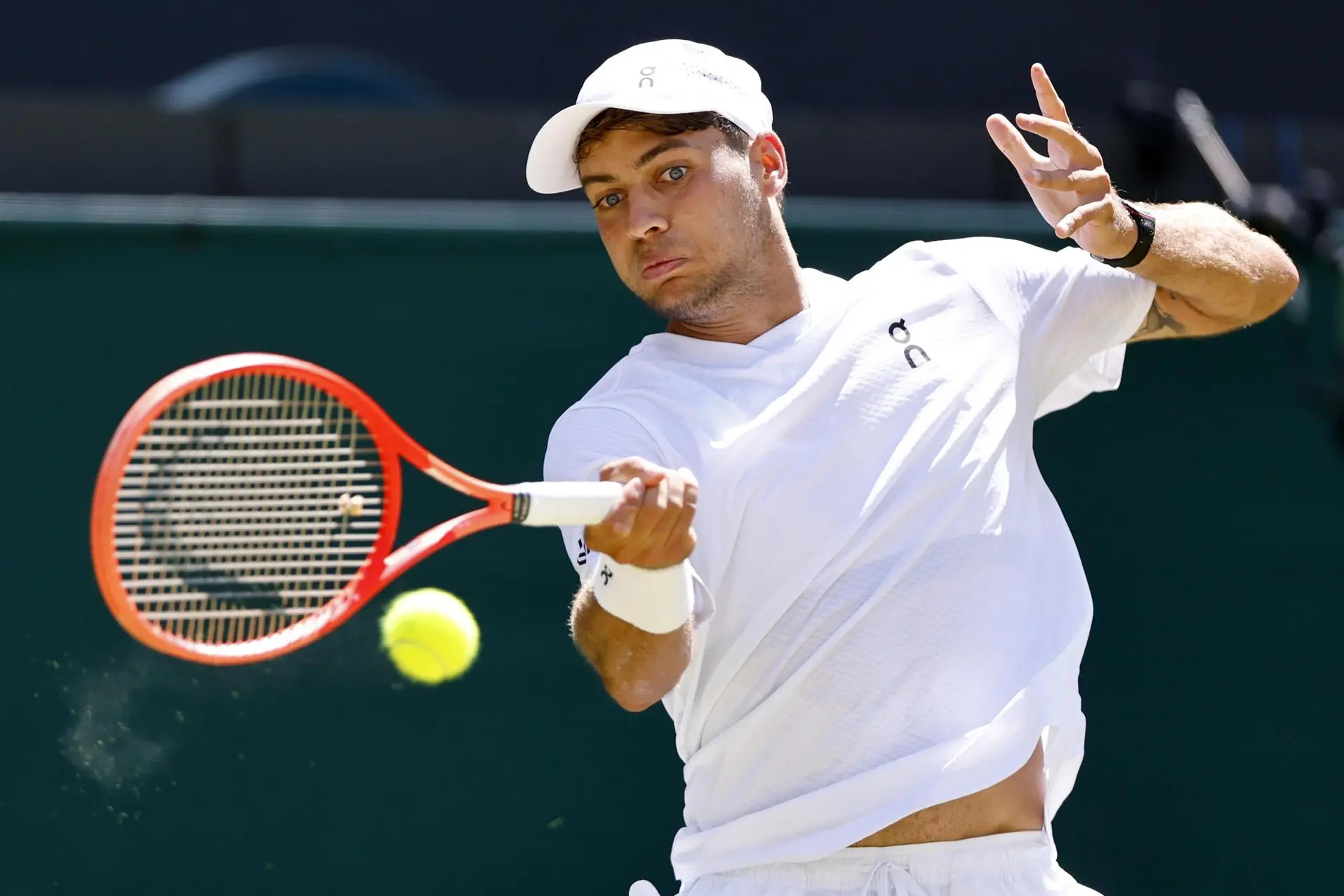 epa13091492 Flavio Cobolli of Italy in action during his Men's Singles fourth round match against Alex de Minaur of Australia at the Wimbledon Championships in London, Britain, 06 July 2026. EPA/TOLGA AKMEN