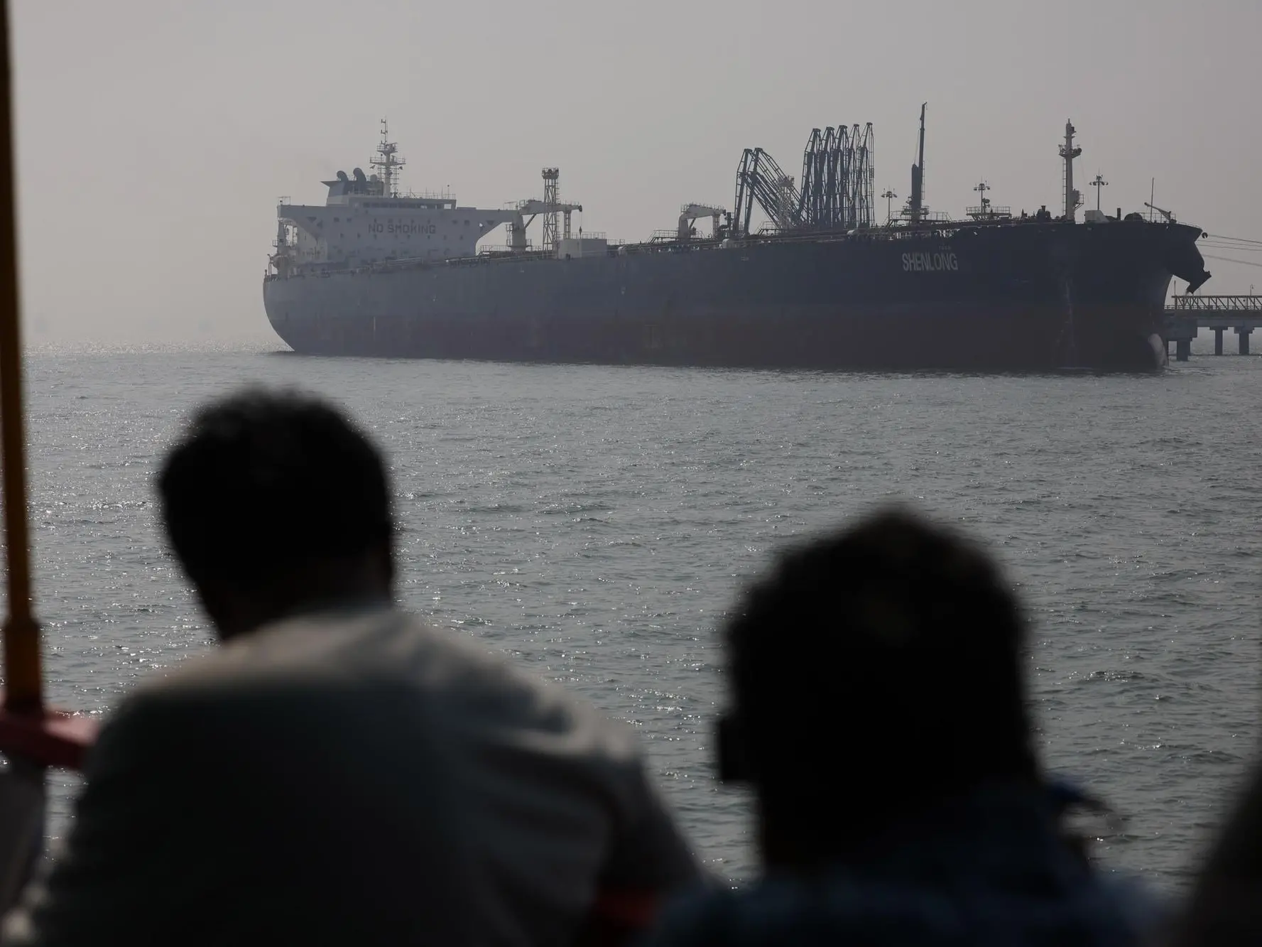 epa12813803 The Liberia-flagged tanker Shenlong, carrying crude oil from Saudi Arabia to India via the Strait of Hormuz, arrives at Mumbai Port in Mumbai, India, 12 March 2026. Iran has allowed Indian oil tankers to pass through the Strait of Hormuz following diplomatic talks between External Affairs Minister S. Jaishankar and his Iranian counterpart Abbas Araghchi. EPA/DIVYAKANT SOLANKI