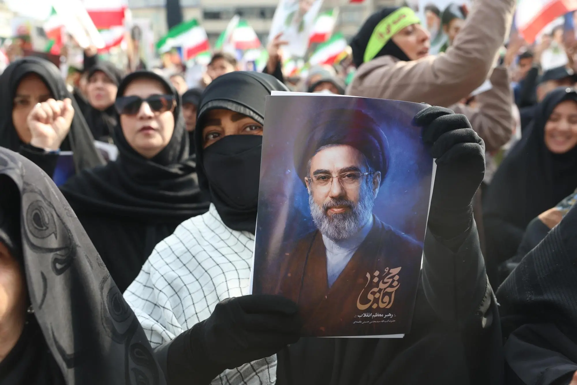 epa12806151 Iranians gather at Enqelab Square to show support for the newly appointed Supreme Leader Ayatollah Mojtaba Khamenei in Tehran, Iran, 09 March 2026. The late Supreme Leader Ayatollah Ali Khamenei was killed during a joint Israeli and US military operation across Iran in the early hours of 28 February 2026. EPA/ABEDIN TAHERKENAREH