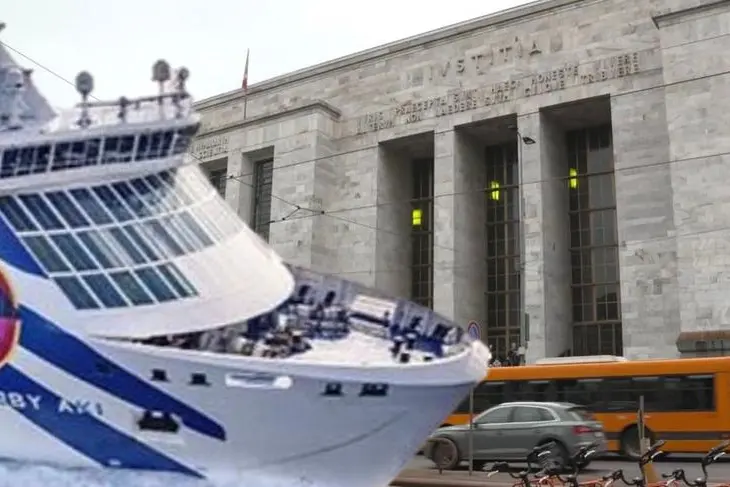 In primo piano la Moby Aki, una delle navi in vendita. Sullo sfondo il Tribunale di Milano (foto L'Unione Sarda)