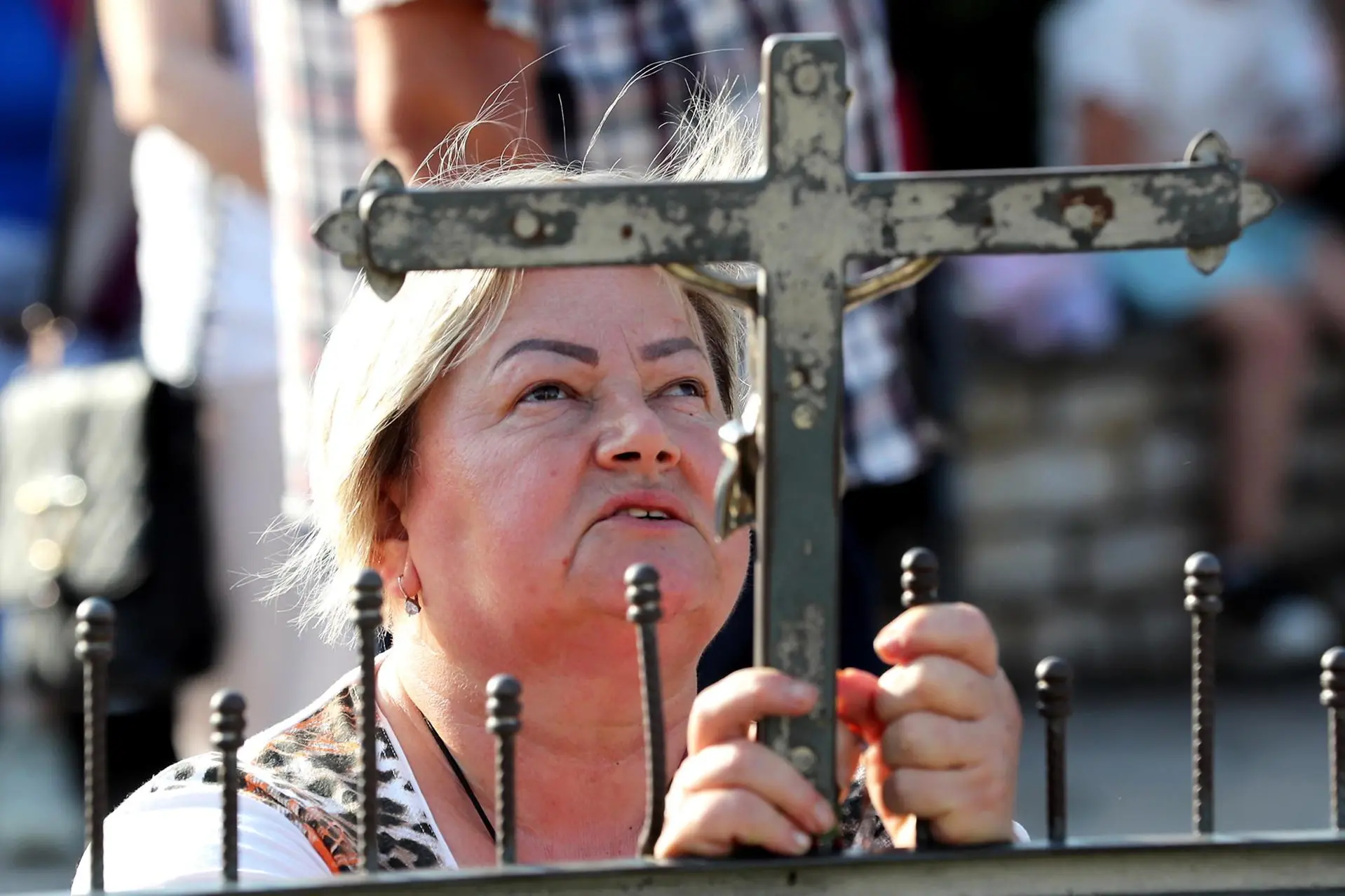 epa10710829 A pilgrim prays in front of the statue of Our Lady of Medjugorje, in the village of Medjugorje, Bosnia and Herzegovina, 25 June 2023. Pilgrims gathered in Medjugorje to mark the 42nd anniversary of the alleged appearance of the Virgin Mary to local shepherds in the hills surrounding the village on 24 June 1981. More than 30 million people are believed to have visited the world-famous village since the Virgin's first appearance, which the Catholic Church has not yet recognized. EPA/FEHIM DEMIR