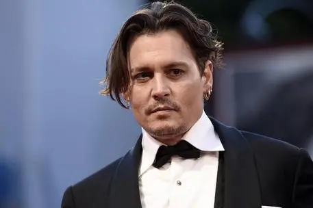 US actor Johnny Depp arrives for the premiere of 'The danish girl' at the 72nd annual Venice International Film Festival, in Venice, Italy, 05 September 2015. The movie is presented in official competition 'Venezia 72' at the festival running from 02 September to 12 September. ANSA/CLAUDIO ONORATI